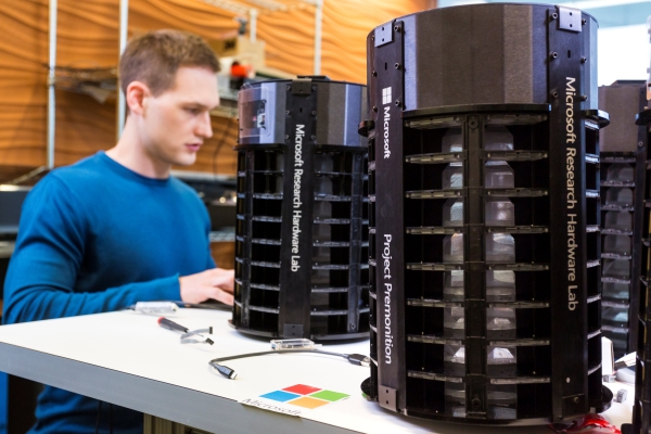 Microsoft Researcher Ethan Jackson works on the AI technology that the drives Project Premonition mosquito trap in this handout photo. - Reuters