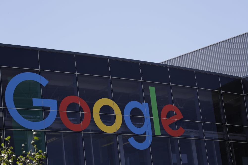 This Tuesday file photo shows the Google logo at the company's headquarters in Mountain View, Calif. Alphabet Inc., the parent company of Google, reported fine earnings on Monday. — AP