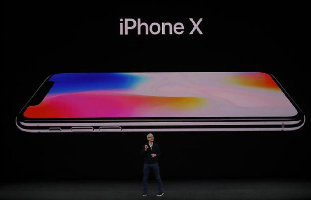 Apple CEO Tim Cook announces the new iPhone X during an Apple special event at the Steve Jobs Theatre on the Apple Park campus on September 12, 2017 in Cupertino, California. — AFP