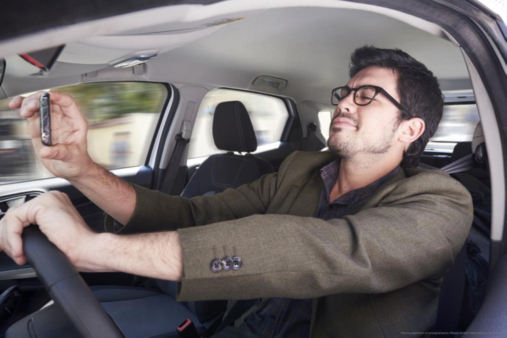 Text or talk while driving? brain probably disagrees