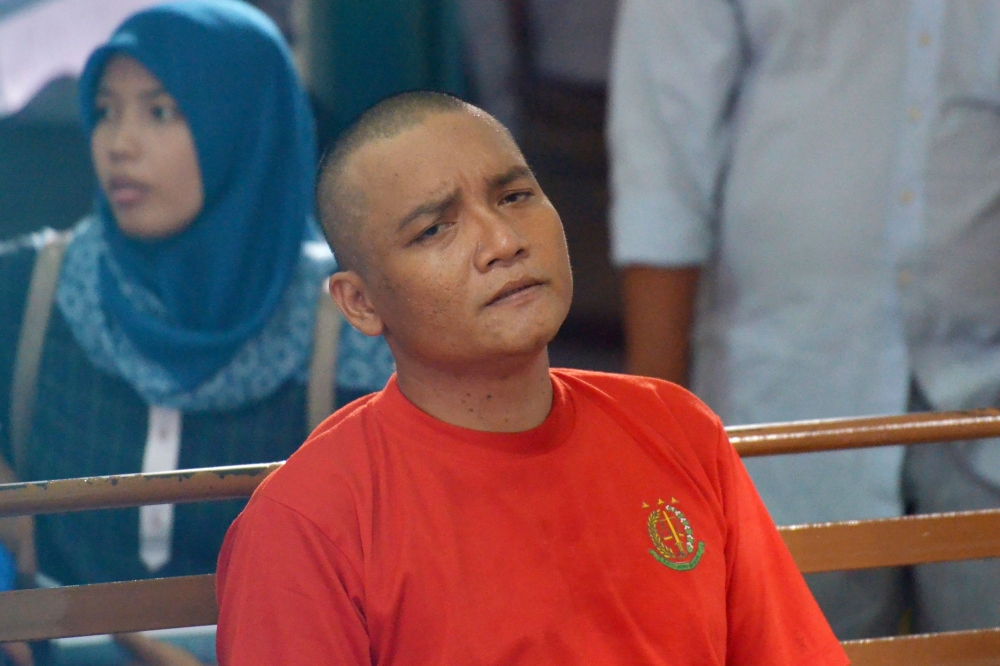 Khaireyll Benjamin Ibrahim, alias Benjy, attends his trial at a court in Medan, Indonesia on Wednesday. - AFP