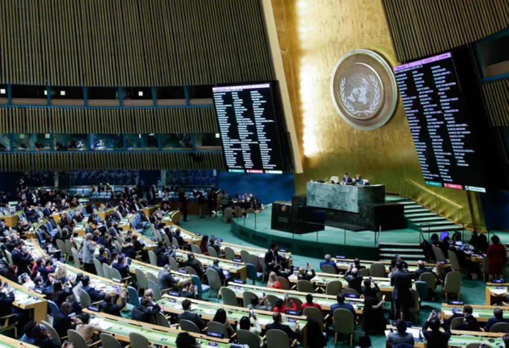 :The results of the vote on Jerusalem are seen on display boards at the General Assembly hall, on Thursday at UN Headquarters in New York. — AFP 