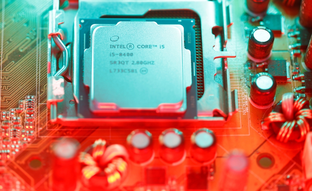 This file photo shows an Intel processor in Brussels. Amid a frantic rush to patch a computer security flaw, experts struggled on Friday to determine the impact of a newly discovered vulnerability which could affect billions of devices worldwide. Computer chipmaking giant Intel — the focus of the first reports on the flaw — said the company and its partners 
