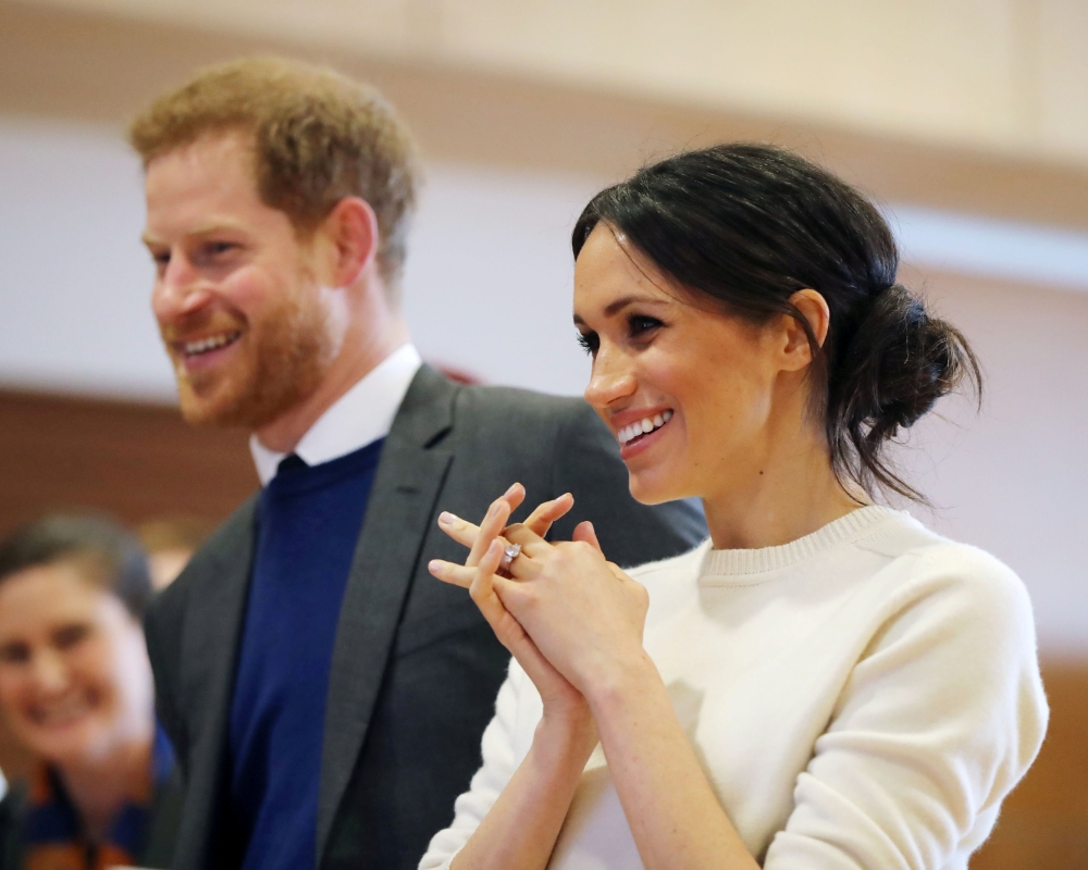 Prince Harry and Meghan Markle during a visit to Catalyst Inc science park in Belfast, Northern Ireland, on Saturday. - Reuters