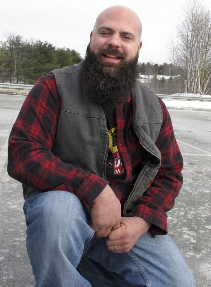 Steve Jalbert poses during the Make-a-Wish fund-raising contest in Burlington, Vermont on Sunday. - AP