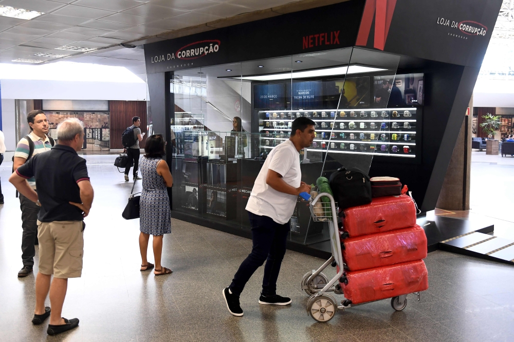 Passengers stop to take a look at the 