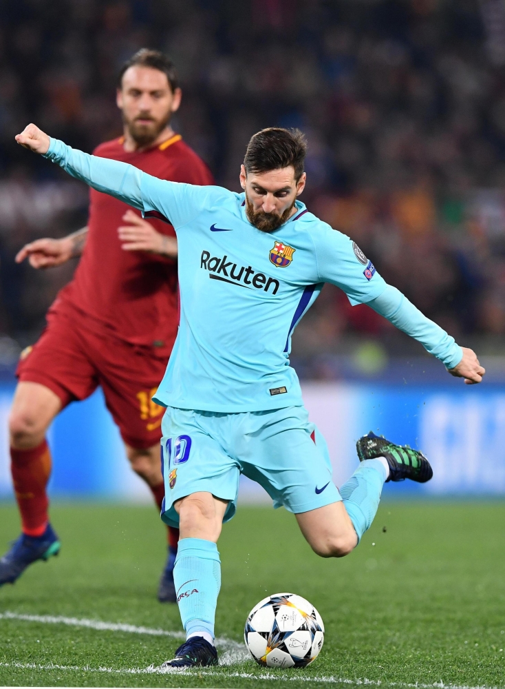 Barcelona's Lionel Messi in action during the UEFA Champions League quarter final second leg match between AS Roma and FC Barcelona at Olimpico stadium in Rome on Tuesday. - EPA