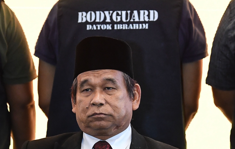 Malaysia's King of Bomoh, Ibrahim Mat Zin, attends a press conference in Malaysia's northern town of Ipoh on Tuesday. - AFP