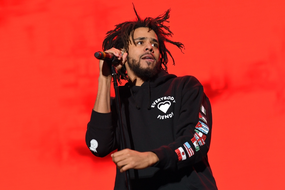 (FILES) In this file photo taken on October 1, 2016, rapper J. Cole performs during The Meadows Music & Arts Festival in New York City. In an age when so much of hip-hop revels in thug life, an earnest warning by rapper J. Cole on the dangers of drugs has proven a runaway success. Cole's 