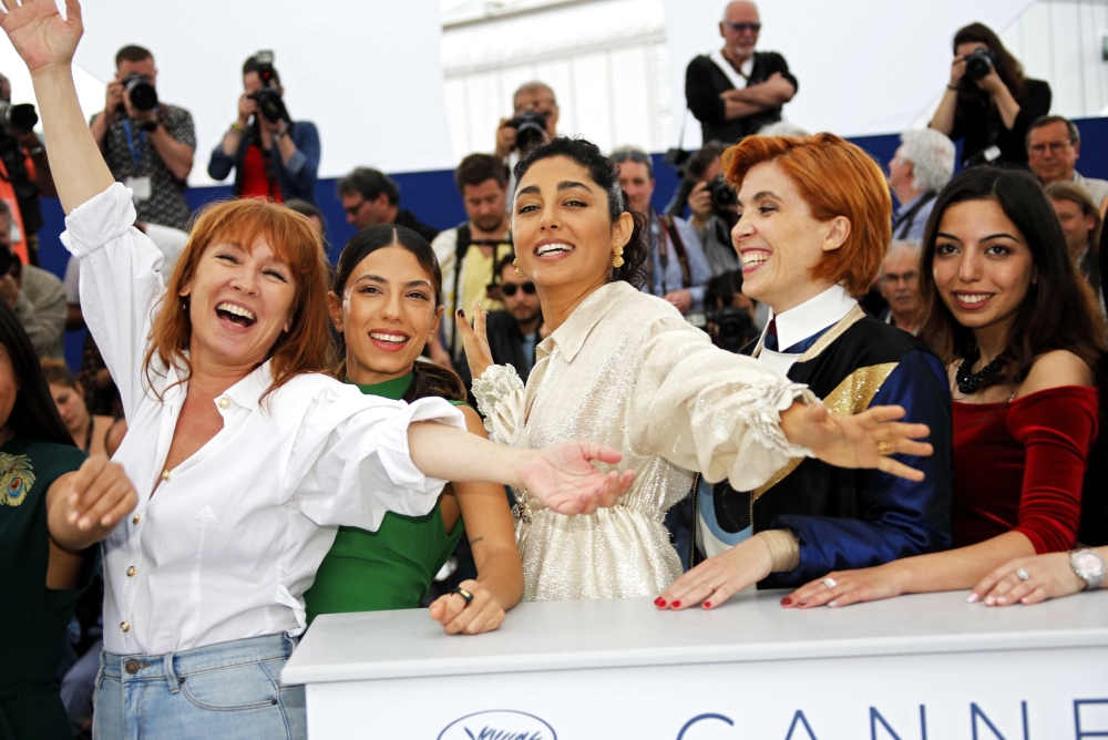 From left, director Eva Husson poses with cast members Evin Ahmad, Emmanuelle Bercot, Golshifteh Farahani and Mari Samidovi during a photocall for their film 
