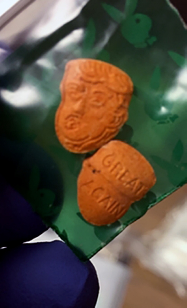 This handout picture released by Indiana State Police, shows Donald Trump-shaped ecstasy pills stamped with the logo 
