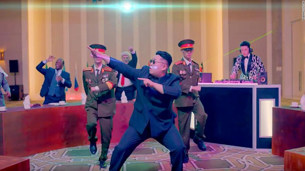 A scene from a music video that sees K-Pop star Seungri invading a summit between US President Donald Trump and North Korean leader Kim Jong Un.