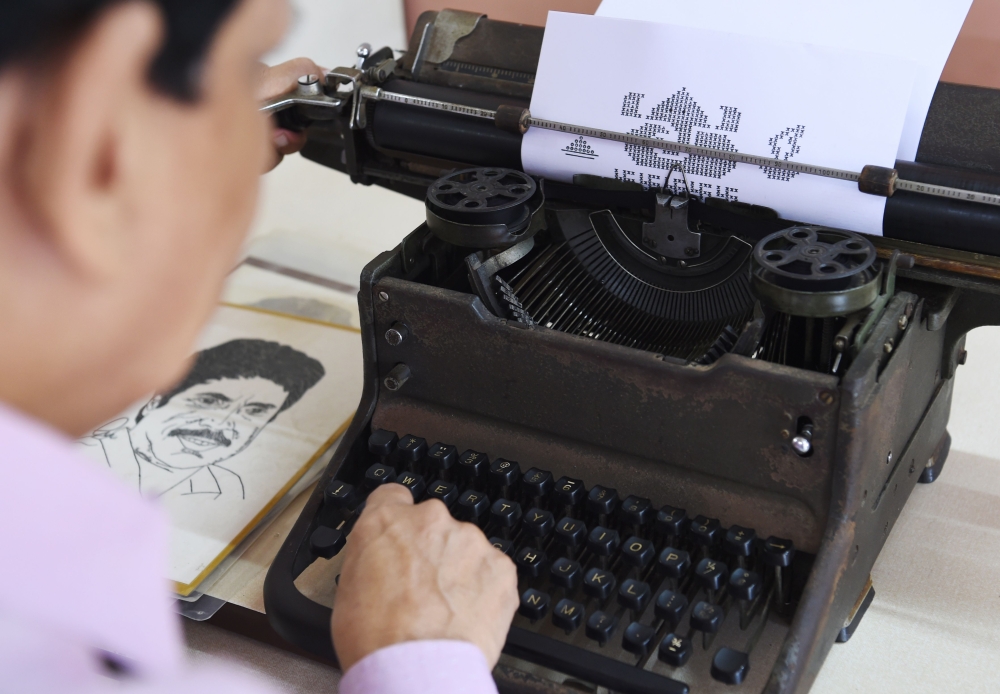 Clickety-clack, clickety-clack, ding rings out from a home in India's Mumbai where Chandrakant Bhide is creating his latest artwork - on a typewriter. From politicians and film stars to cricketers, animation characters and religious symbols, Bhide has produced around 150 pieces of typewriter art. - AFP