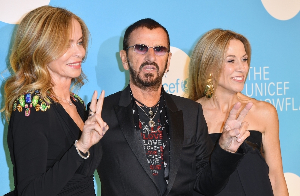 


(From L) Actress Barbara Bach, musician Ringo Starr and singer-songwriter Sheryl Crow attend the 14th Annual UNICEF Snowflake Ball in New York City. — AFP