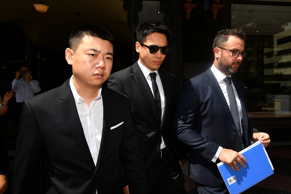 Chinese actor Gao Yunxiang leaves the Downing Center court in Sydney, Australia. — REuters