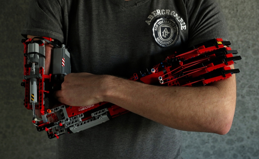 David Aguliar poses with his prosthetic arm built with Lego pieces during an interview with Reuters in Sant Cugat del Valles, near Barcelona, Spain. — Reuters