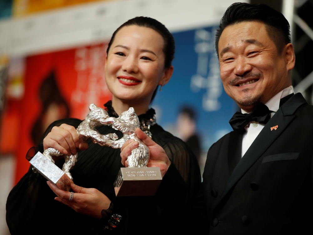 Actors Yong Mei and Wang Jingchun pose with Silver Bears for Best Actor and Actress for Di jiu tian chang (So Long, My Son) after the news conference at the 69th Berlinale International Film Festival in Berlin, Germany. — Reuters