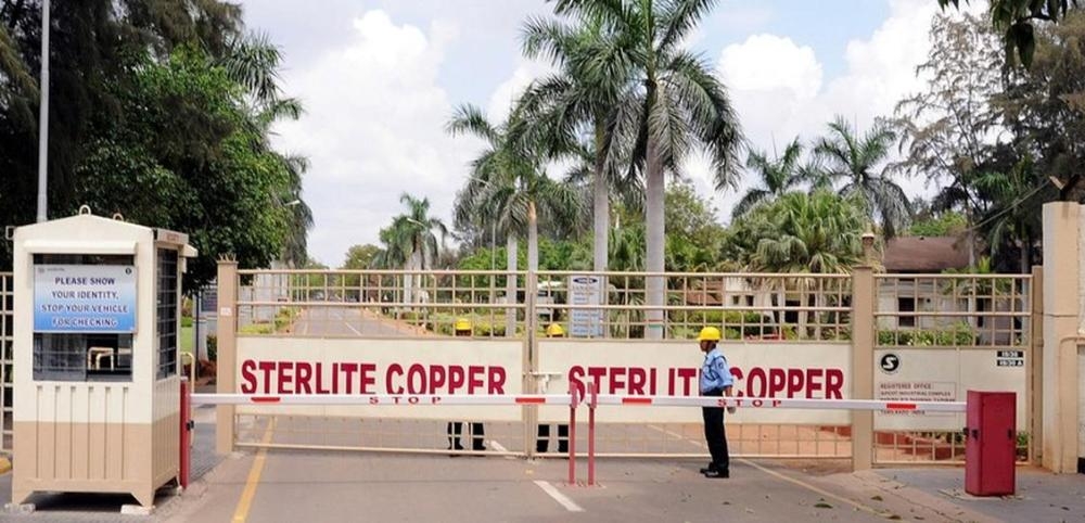 File photo shows a private security guard standing in front of the main gate of Sterlite Industries Ltd's copper plant in Tuticorin, in the southern Indian state of Tamil Nadu, India. — Reuters