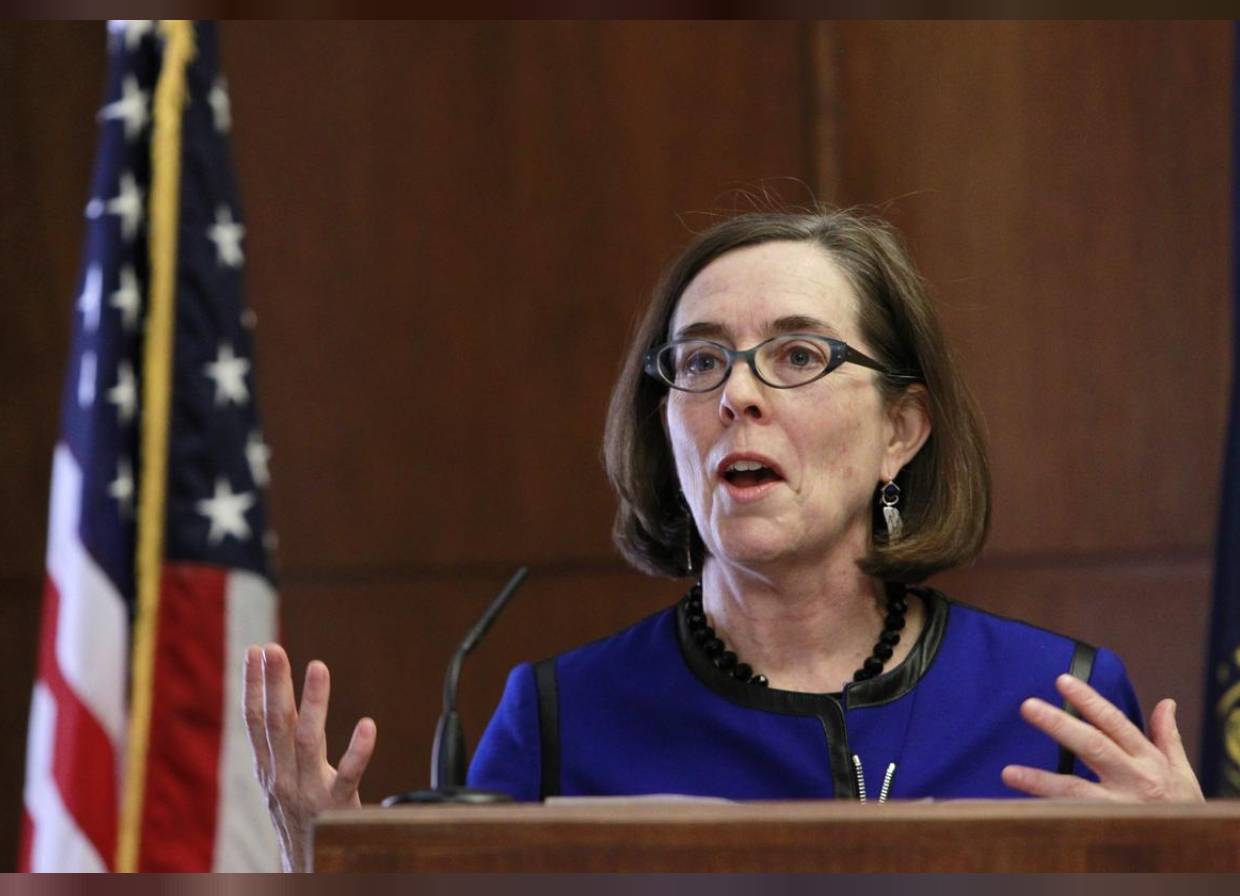 In this file photo, Oregon Governor Kate Brown speaks at the state capital building in Salem, Oregon, February 20, 2015. - Reuters