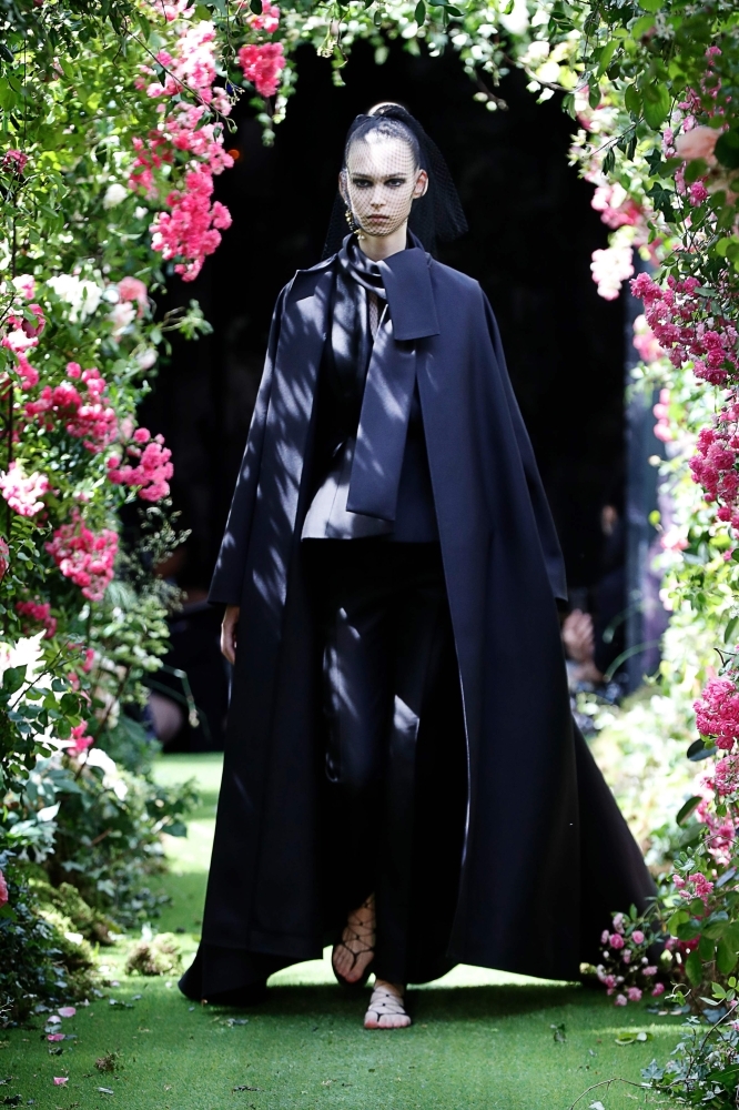 Models present a creation by Christian Dior during the Women's Fall-Winter 2019/2020 Haute Couture collection fashion show in Paris. — AFP