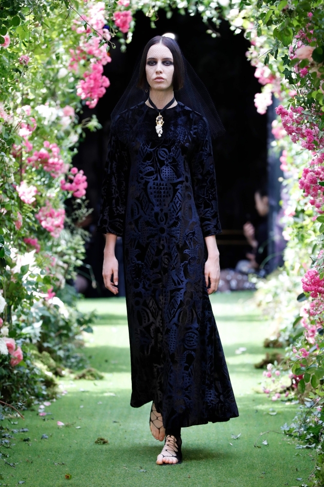 Models present a creation by Christian Dior during the Women's Fall-Winter 2019/2020 Haute Couture collection fashion show in Paris. — AFP