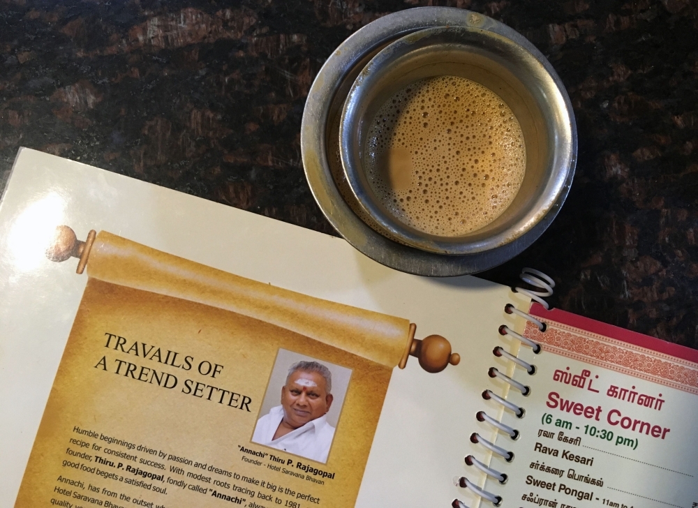 This file photo shows the image of P. Rajagopal, founder of the Saravana Bhavan food chain, on a menu at one of the popular restaurants in Chennai. The founder of a trailblazing Indian restaurant chain dubbed the 