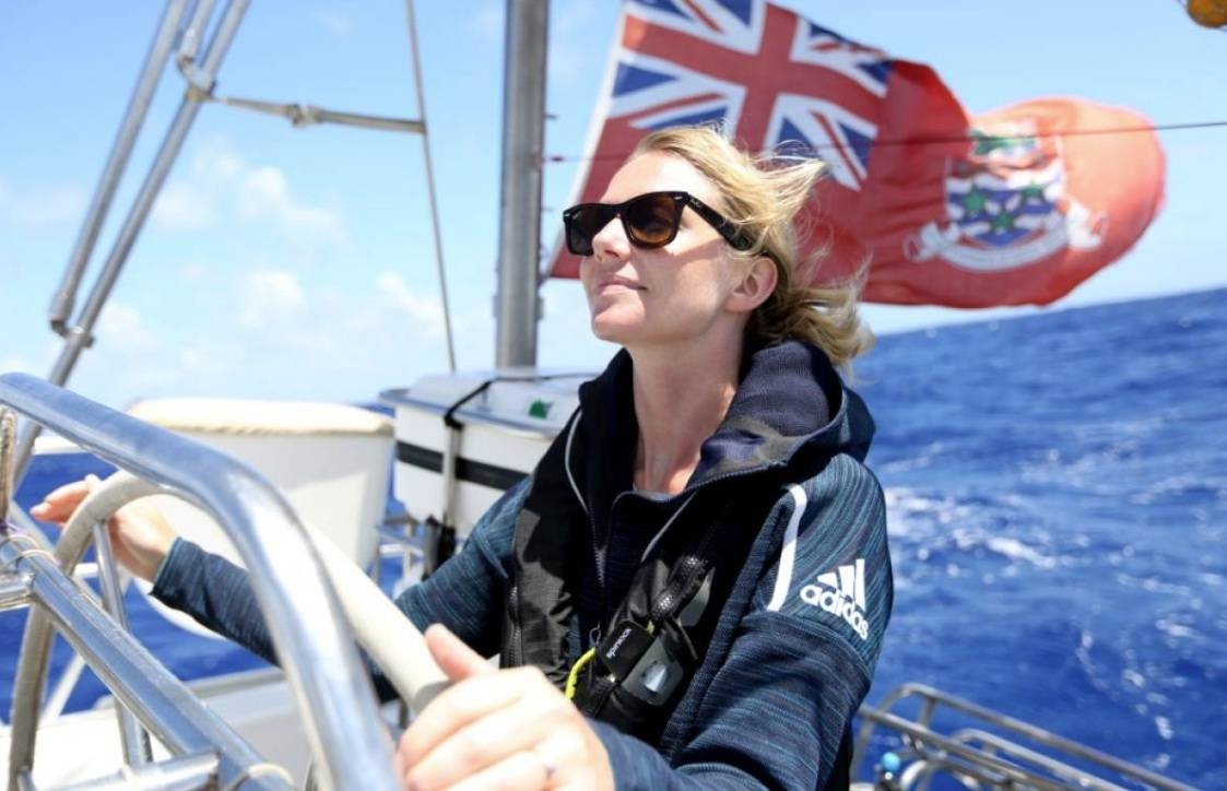 Emily Penn, mission director of eXXpedition Round the World, is seen at the helm during the organization’s North Pacific voyage in June 2018. — Courtesy photo