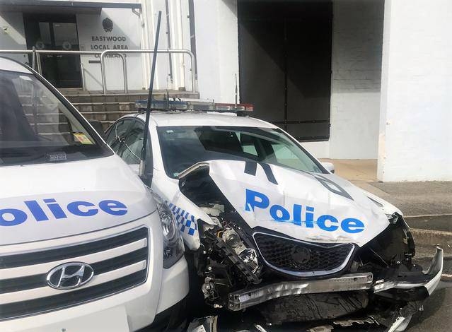 A clumsy driver led police to a drug bust in Australia after he crashed a van laden with methamphetamines into a patrol car parked outside a police station in suburban Sydney. 