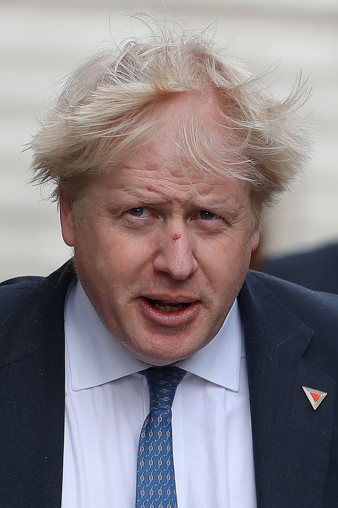 In this file photo taken on March 7, 2018, Britain's Foreign Secretary Boris Johnson arrives in Downing Street in London.  At different times described as a 