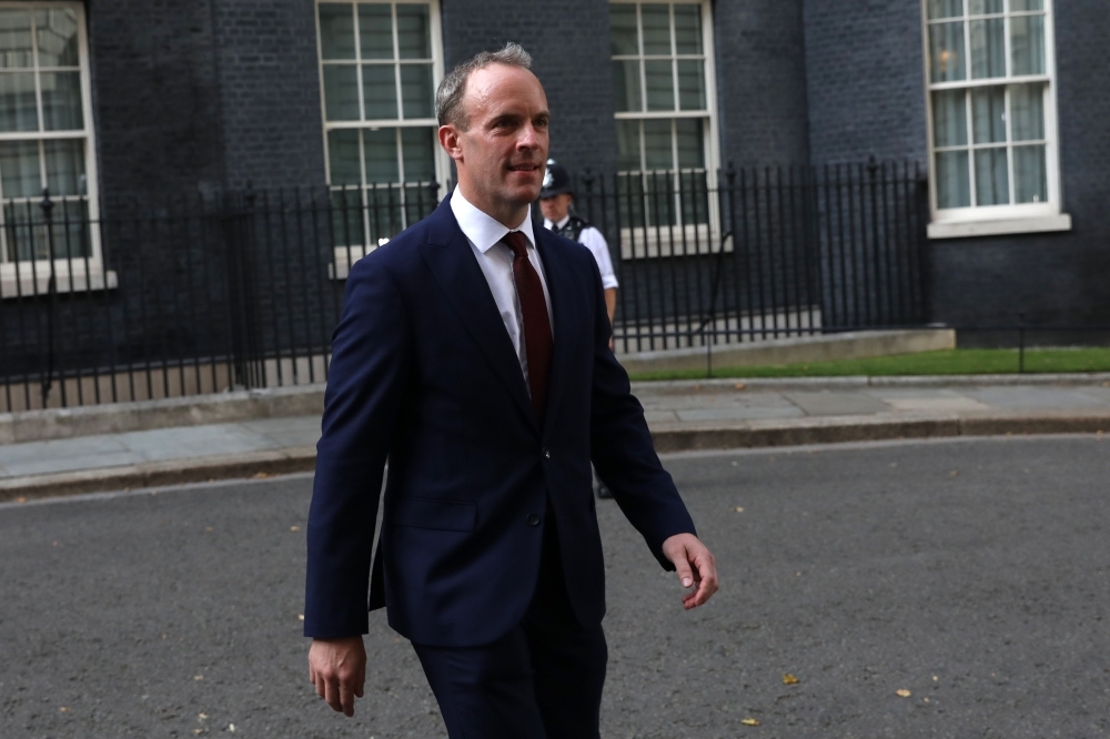 Britain's newly appointed Foreign Secretary Dominic Raab leaves 10 Downing Street in London on Wednesday. — AFP