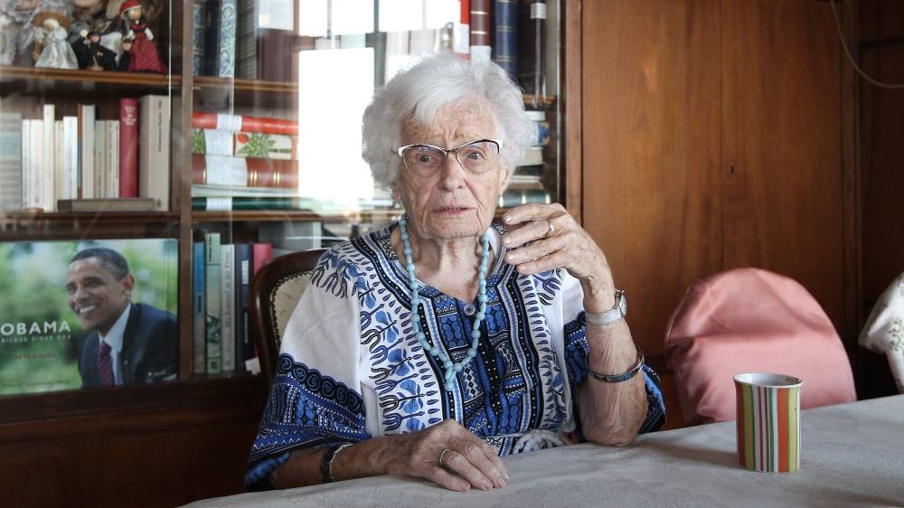 Lisel Heise, 100 years of age and member of the town council of the German southwestern city of Kirchheimbolanden answers AFP journalists' questions at her home. — AFP