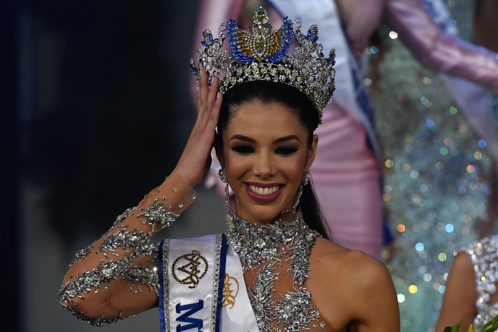 Thalia Olvino representative of the Delta Amacuro reacts during the Miss Venezuela beauty pageant in Caracas, Venezuela, on Thursday. — AFP