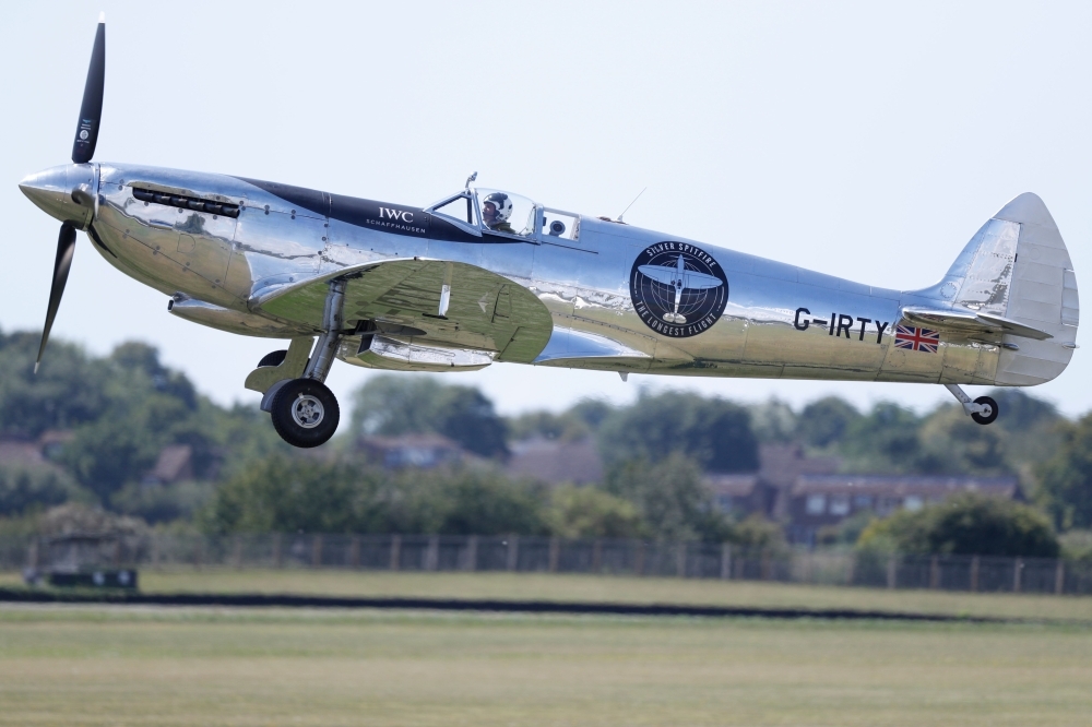 British aviator Matt Jones takes off in a restored World War II Silver Spitfire plane as he begins a round-the-world flight attempt at Goodwood Aerodrome in Chichester, southeast England, on Monday. — AFP