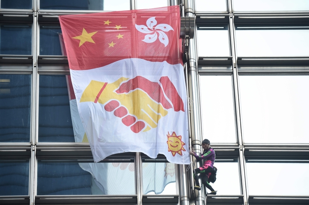  French urban climber Alain Robert, popularly known as the 