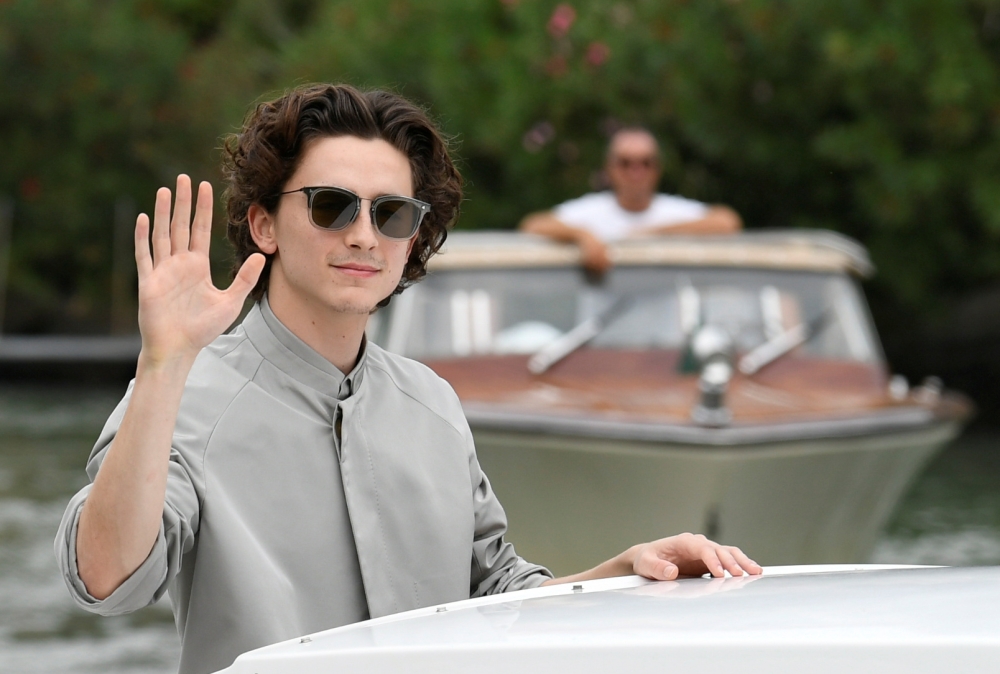  Timothee Chalamet gestures as he arrives for 