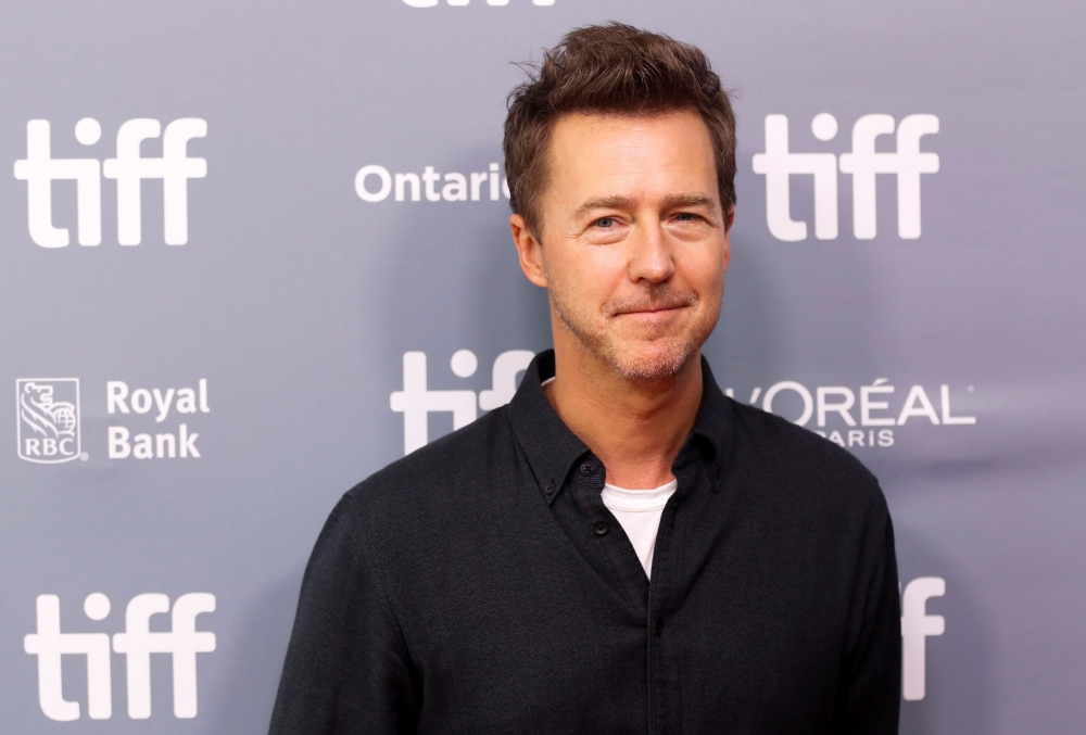 Director Edward Norton poses before a news conference for 