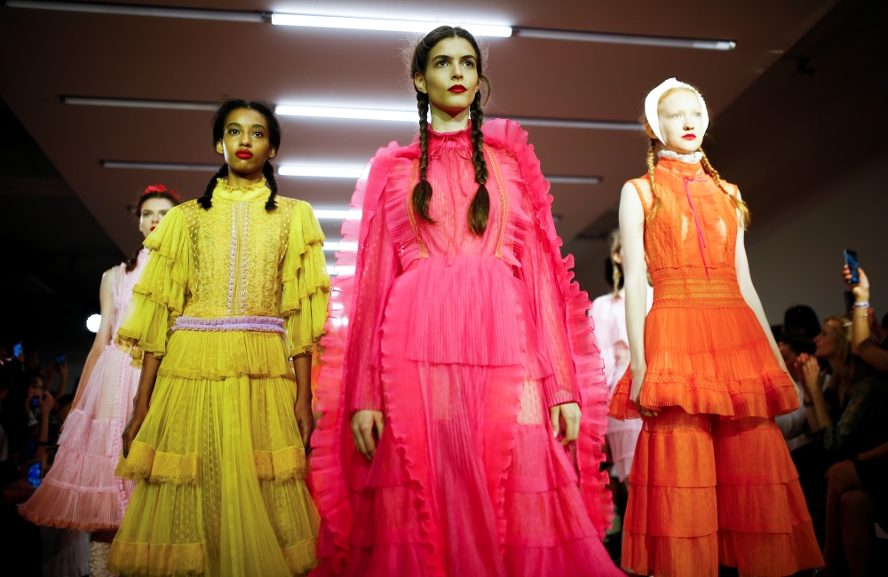 Models present creations during the Bora Aksu catwalk show during London Fashion Week in London, Britain, on Friday. — Reuters