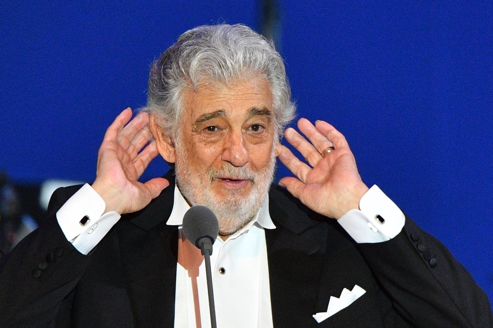Spanish tenor Placido Domingo gestures as he performs during his concert in the newly inaugurated sports and culture center 'St Gellert Forum' in Szeged, southern Hungary, in this Aug. 28, 2019 file photo. — AFP