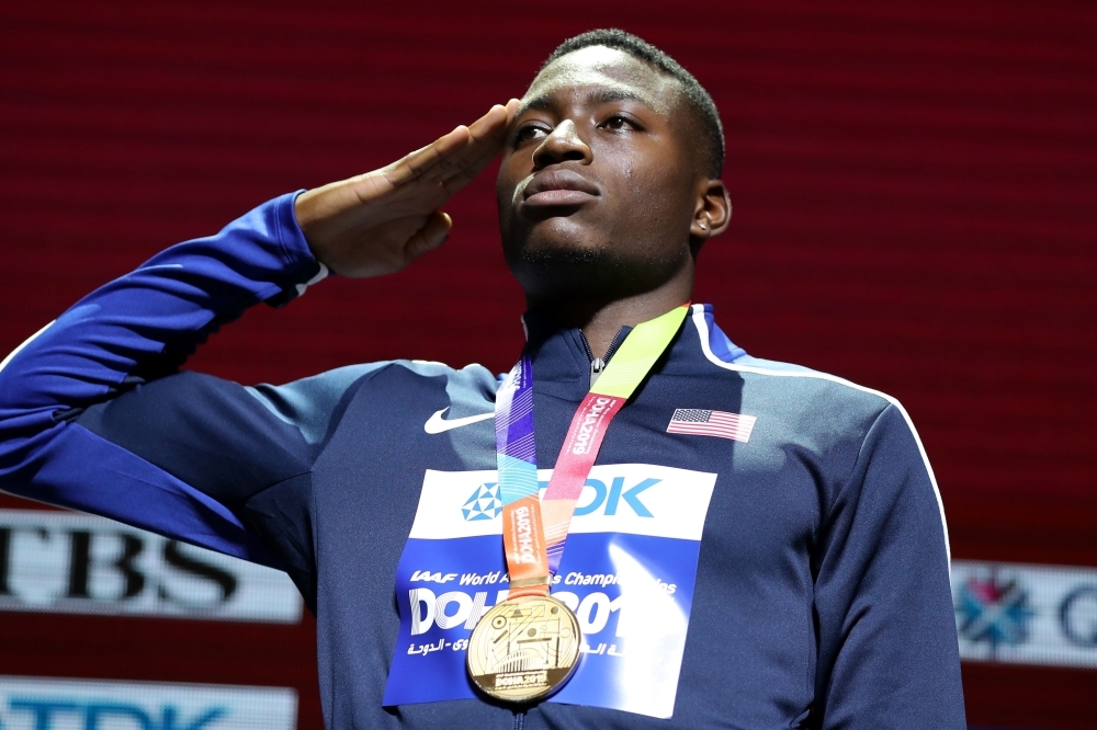 Gold medalist USA's Grant Holloway poses on the podium during the medal ceremony for the Men's 110 Hurdles at the 2019 IAAF World Athletics Championships in Doha on Thursday. — AFP