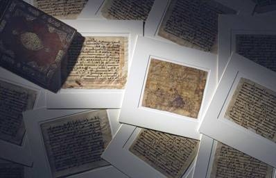 Group of large Kufic Qur’an leaves.