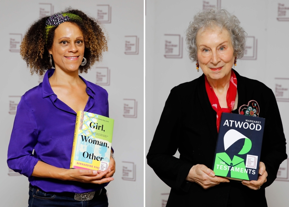 A combination of pictures created on Tuesday shows British author Bernardine Evaristo, left, posing with her book 'Girl, Woman, Other' and Canadian author Margaret Atwood poses with her book 'The Testaments' during the photo call for the authors shortlisted for the 2019 Booker Prize for Fiction at Southbank Centre in London on Oct. 13, 2019. — AFP