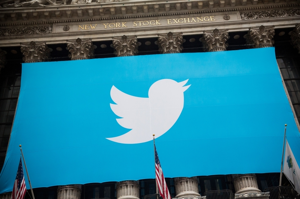 The Twitter logo is displayed on a banner outside the New York Stock Exchange  in this Nov. 7 file photo. — AFP