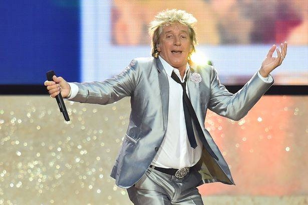 Rod Stewart rocks out on stage at the opening ceremony of the 2014 Glasgow Commonwealth Games at Celtic Park in this file photo. — AFP