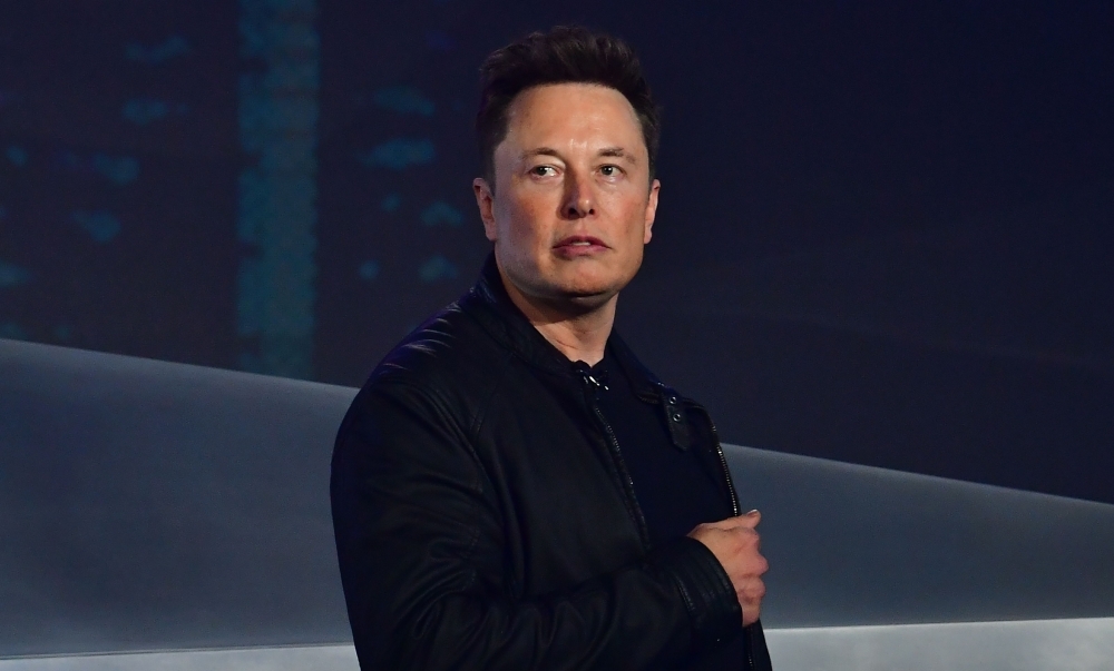 Tesla co-founder and CEO Elon Musk gestures while wrapping up his presentation of the newly unveiled all-electric battery-powered Tesla Cybertruck at Tesla Design Center in Hawthorne, California, on Thursday. — AFP