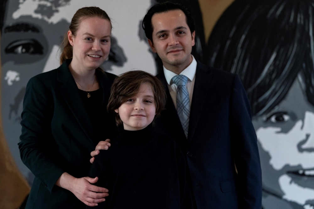 Belgian student Laurent Simons, 9 years old, poses during a photo session at his home in Amsterdam on Thursday. — AFP