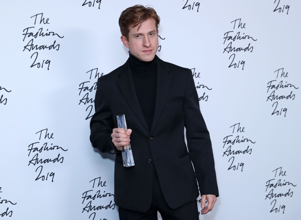 Bottega Veneta Creative director Daniel Lee poses after the company won the Brand of the Year award, following their award presentation at The Fashion Awards 2019 in London, on Monday. — AFP