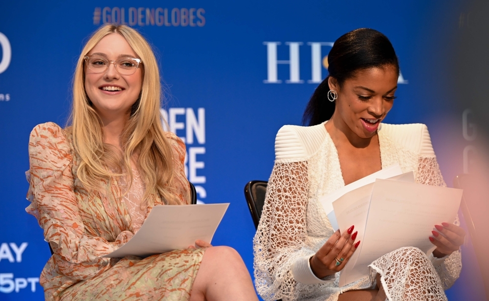 Actress Dakota Fanning, left, and Susan Kelechi Watson attend the 77th Annual Golden Globe Awards nominations announcement at the Beverly Hilton hotel in Beverly Hills on Monday. — AFP