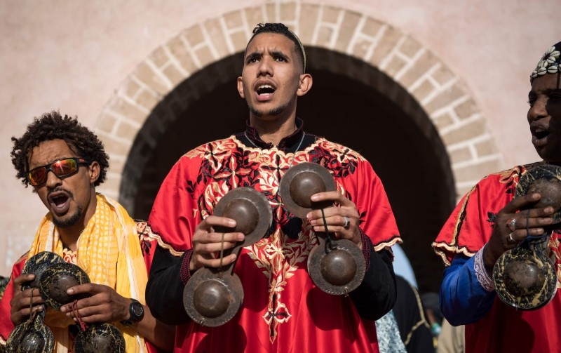 A Gnawa traditional group performs in the city of Essaouira, Morocco, to celebrate the decision of adding the Gnawa culture to UNESCO's list of Intangible Cultural Heritage of Humanity in this Dec. 14, 2019 file photo. — AFP