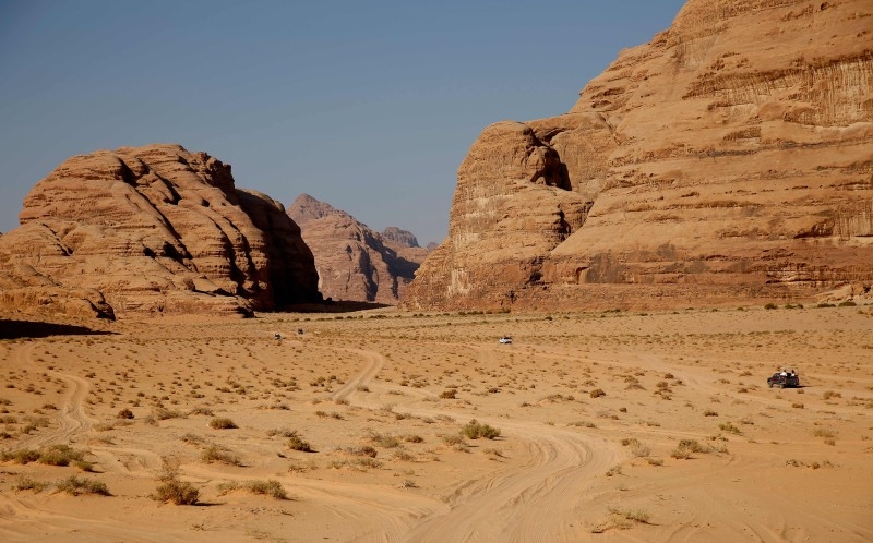 Tourists walk in front of the Khazneh (Treasury) in Jordan's ancient city of Petra in this March 25, 2015 file photo. — AFP