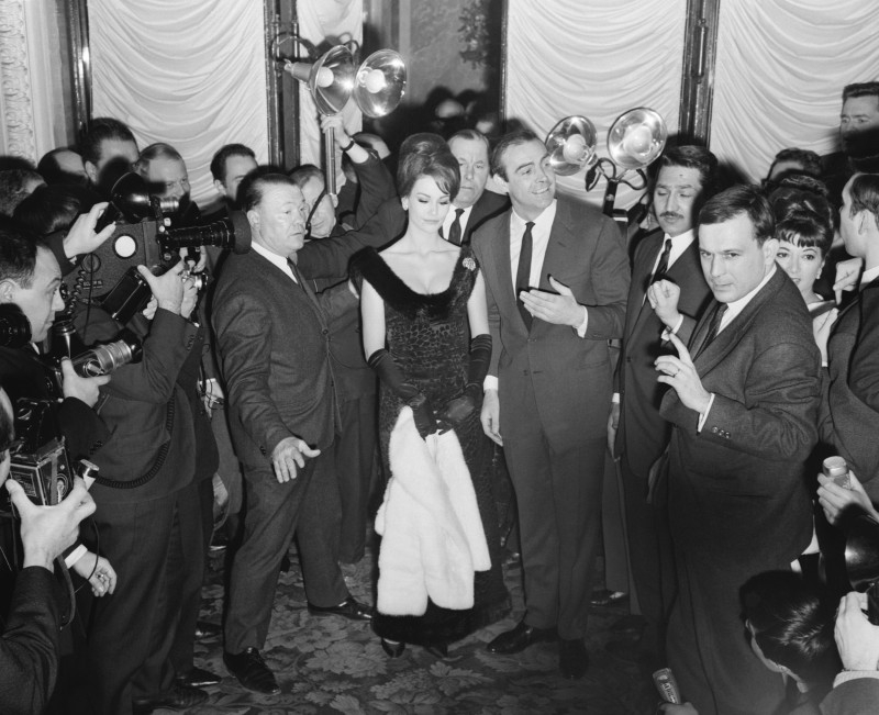 Scottish actor Sean Connery, center right, and French actress Claudine Auger, center left, pose for photographers at a hotel in Paris in this Feb. 19, 1965 file photo. — AFP